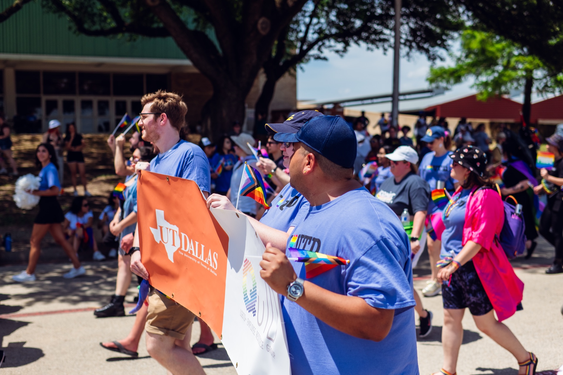 UTD Marchers Holding a Banner at the Dallas Pride Parade